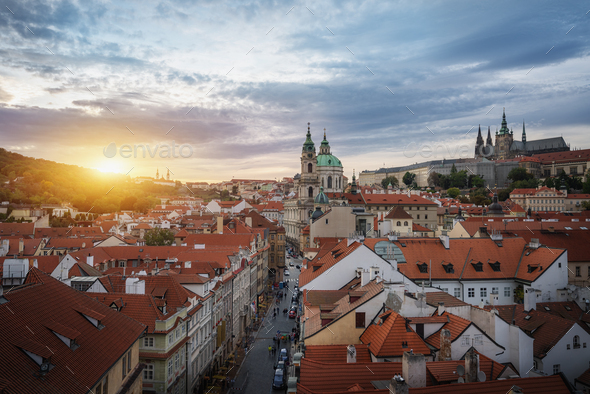 Aerial view of Mala Strana at sunset with St. Nicholas Church and Prague Castle - Prague, Czechia - Stock Photo - Images