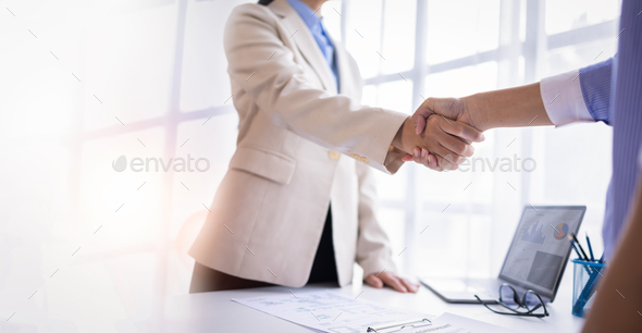 Business handshake for teamwork of business merger and acquisition,successful negotiate,hand shake, - Stock Photo - Images