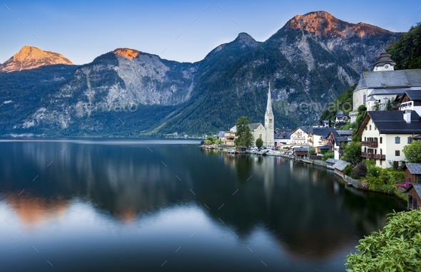 Beautiful shot of the Bad Goisern town in Austria near the lake during the sunset - Stock Photo - Images
