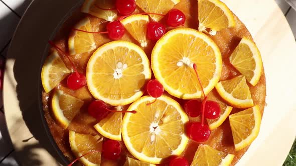 pie with oranges for a event day on picnic checked cloth alt
