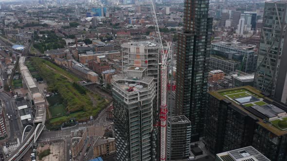 Fly Around Construction Site of New Skyscraper in Shoreditch District alt