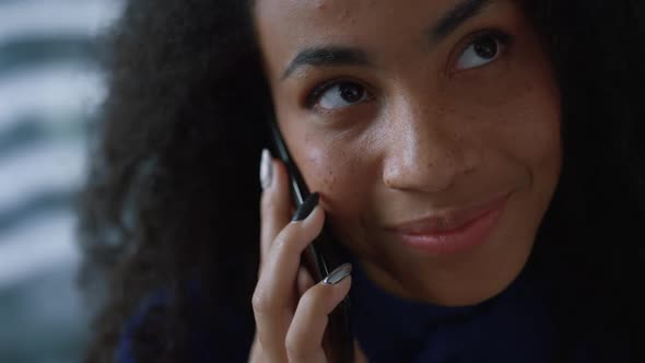 Joyful African American Employee Woman Speaking Manager on Mobile Phone at Home alt