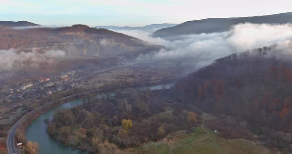 Beautiful View of Village on Fog Morning Covered with Countryside Mountain alt