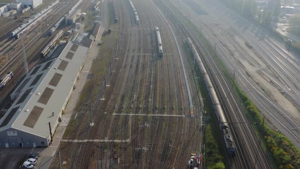 Aerial view. Modern high speed train. Railroad in landscape, aerial view from above.  alt