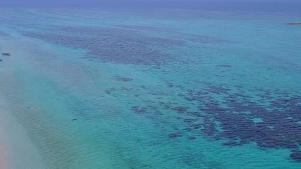 Drone scenery of lagoon beach by blue sea with sand background alt