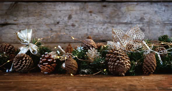 Christmas decorations on wooden plank alt