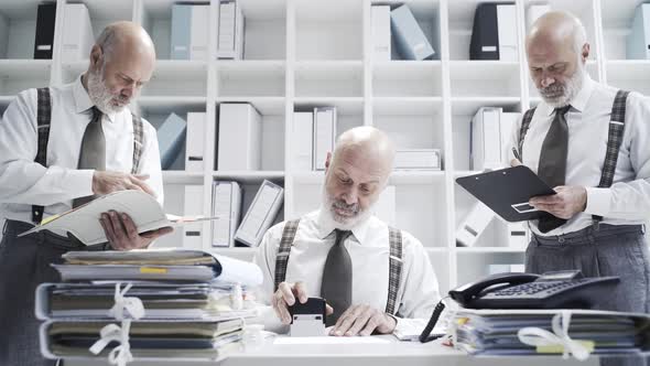 Businessman doing multiple tasks at the same time