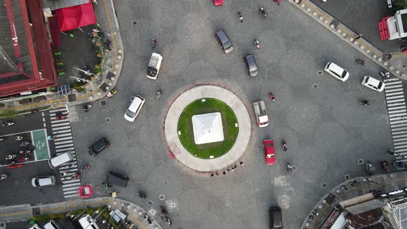 Top aerial view of Tugu Yogyakarta Landmark with busy traffic. alt