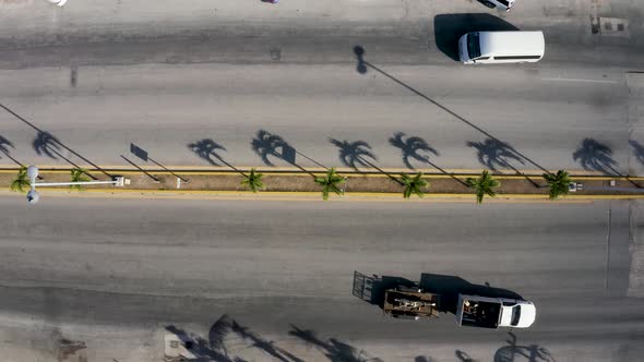 Aerial View of the Street Intersection with Cars Driving Down the Streets alt
