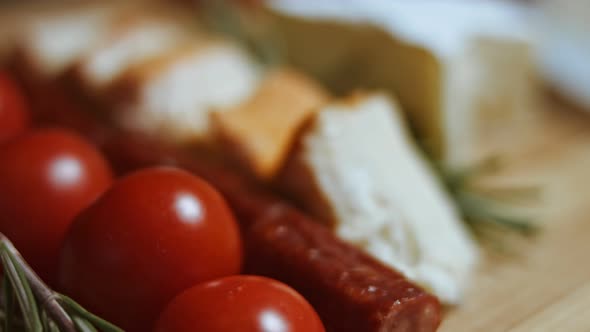 Flat Lay of Cheese and Meat Platter alt