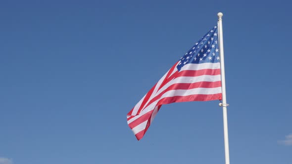 world famous american flag waving in front of blue sky 4k 2160p 30fps uhd footage recognaizable fl by trucic videohive