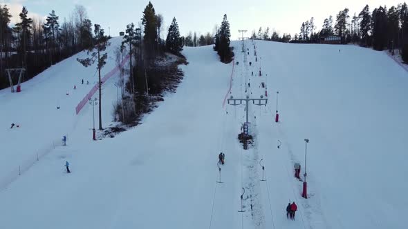 Aerial View of Downhill Skiing at Local Ski Resort. Ski Lift. Russia, Leningrdaskaya Oblast, Village