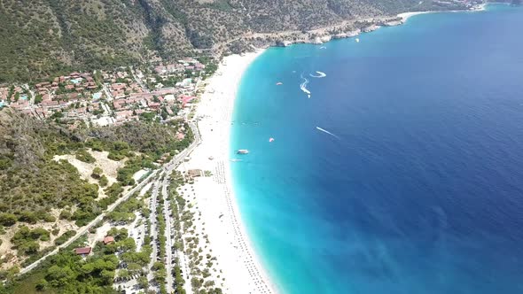 Paragliders Flying Over Sea and Beach on Resort