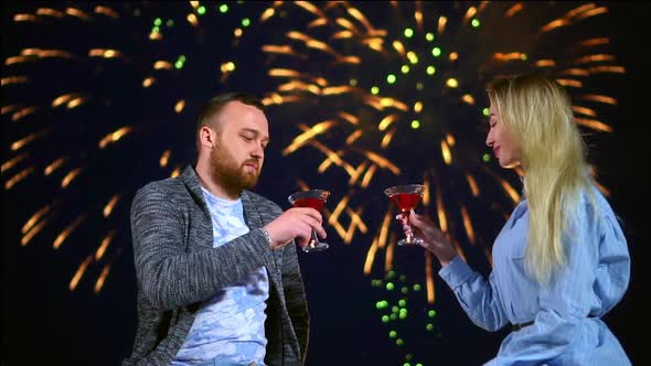 Romantic Couple on Dating Enjoy Fireworks in Night Sky Make Toast Glass Red Wine alt