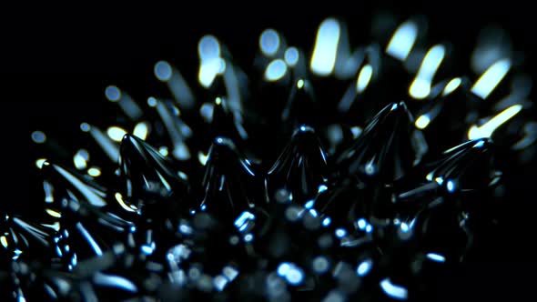 Super Slow Motion Macro Shot of Magnetic Liquid Ferrofluid in Motion at 1000Fps alt