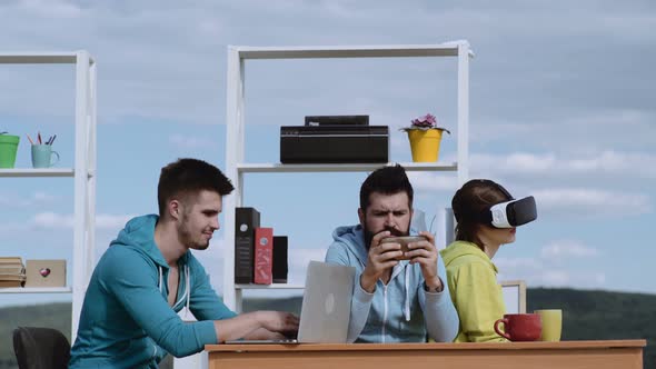 Programmers Cooperating at IT Company Developing apps.Teamwork Concept alt