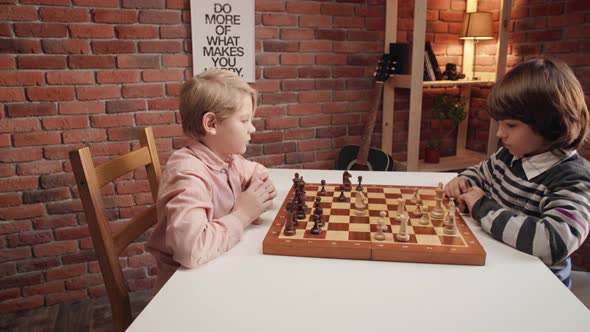 Two Boys Playing Chess
