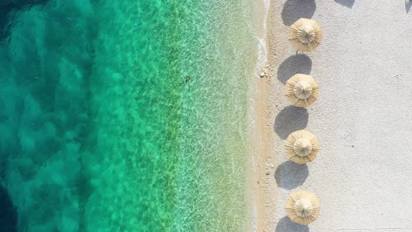 Aerial view on the beach. Vacation and adventure. Beach and blue water alt