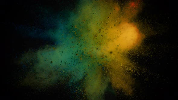 Super Slowmotion Shot of Color Powder Explosion Isolated on Black Background alt