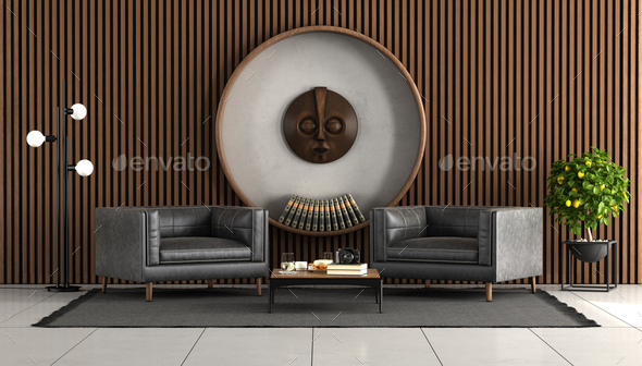 Living room with wooden wall paneling and two leather armchair - Stock Photo - Images