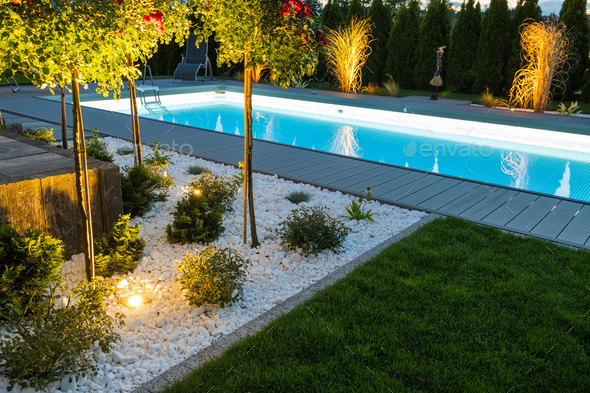 Residential Outdoor Swimming Pool Illuminated by LED Lights - Stock Photo - Images