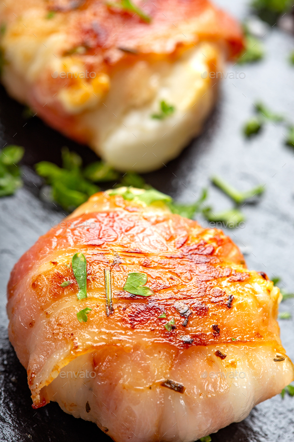 Fried goat cheese covered with smoked bacon - Stock Photo - Images