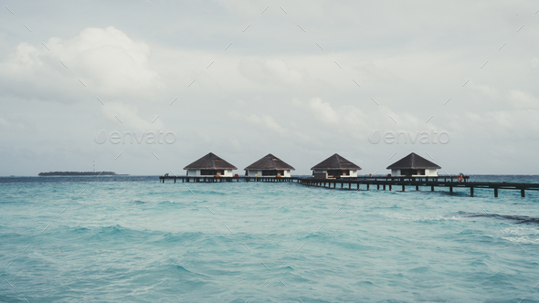 Houses over the sea in the Maldives - Stock Photo - Images
