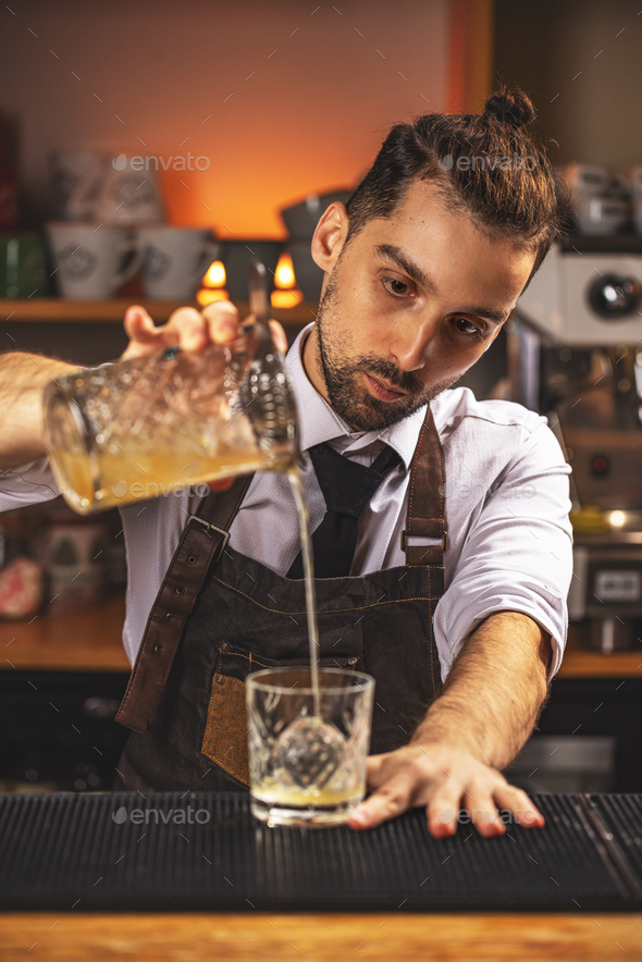 Bartender making cocktail - Stock Photo - Images