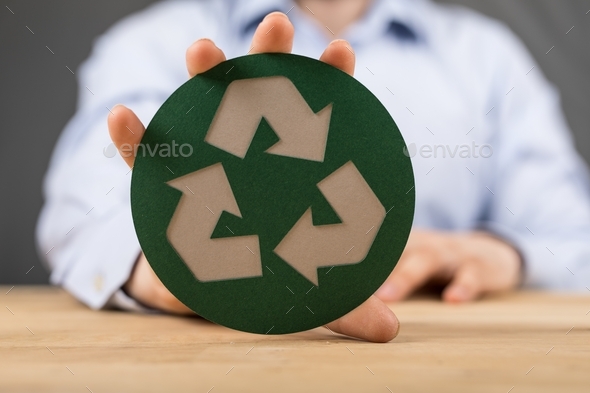 Man showing the symbol of the ecological friendly concept