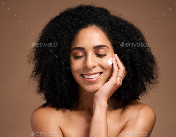 Skincare, cream and black woman with smile for beauty, cosmetics and facial health promotion of pro