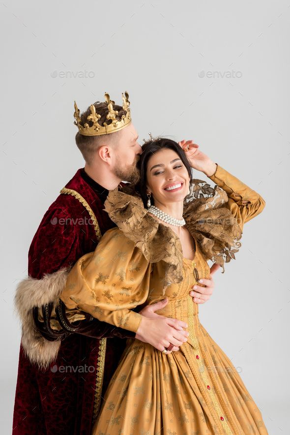 Queen And King With Crowns Hugging Isolated Free Stock Photo and