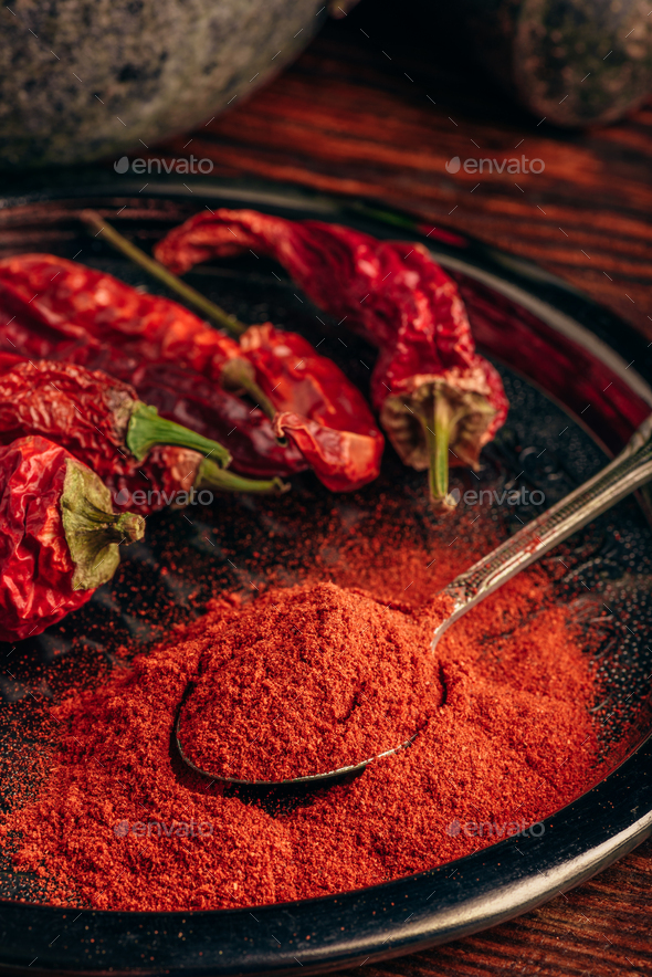 Spoonful of ground chili pepper - Stock Photo - Images