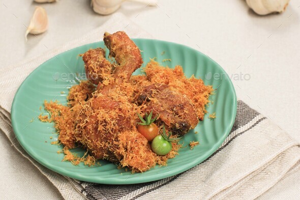 Ayam Serundeng, Indonesian Traditional Fried Chicken Recipe with Shredded Coconut.