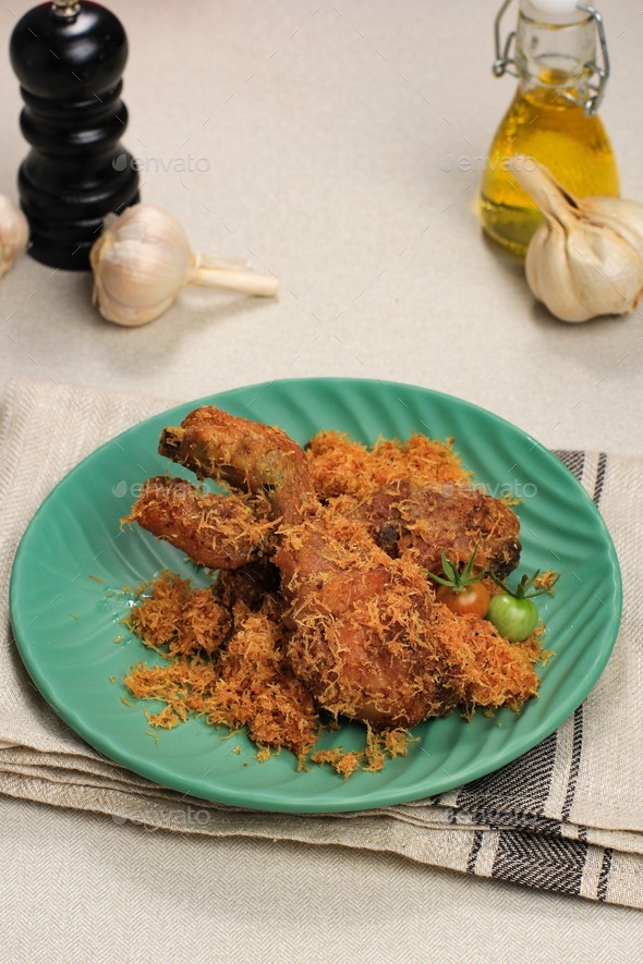 Ayam Serundeng, Indonesian Traditional Fried Chicken Recipe with Shredded Coconut.