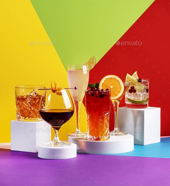 Summer alcoholic cocktails in glasses with rum, gin, prosecco and