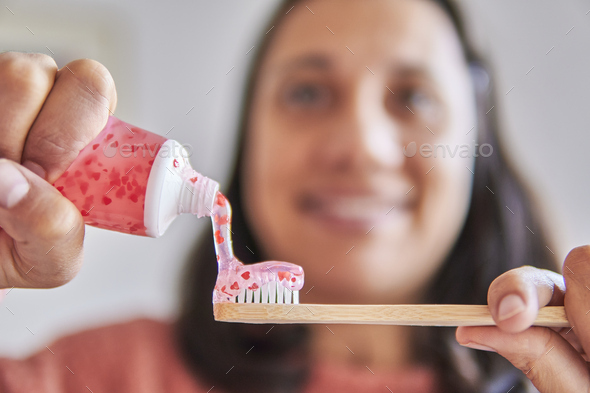 saint valentine toothpaste tube and tooth brush used by happy lady - Stock Photo - Images