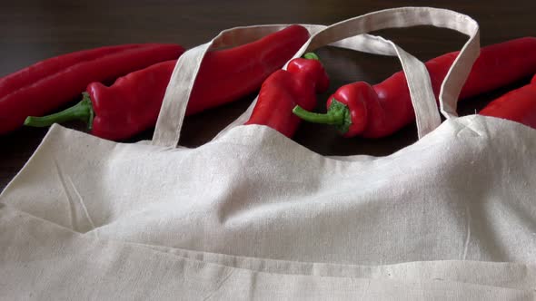 Fresh vegetables organic in eco cotton fabric bags on wooden table