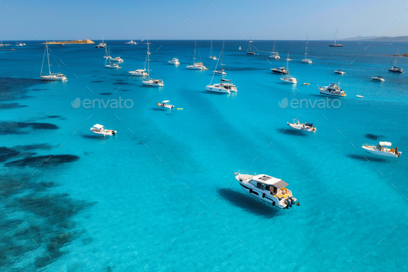 Aerial view of luxury yachts on blue sea at sunny day in summer - Stock Photo - Images