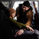 Dad fastening his daughter with seat belt before trip - PhotoDune Item for Sale