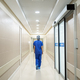 Female doctor walking along a corridor in the hospital - PhotoDune Item for Sale