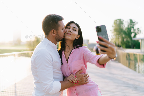 Portrait Of Happy Couple Pose For Selfie Together Stock Photo - Download  Image Now - Hand, Heart Shape, Making - iStock