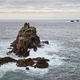 Land&#39;s End, rock islets offshore, the Penwith peninsula, view to a lighthouse and out to sea. - PhotoDune Item for Sale