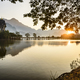 Sunrise over the lake at Hpa An, a footbridge, shrine and mountain landscape. - PhotoDune Item for Sale