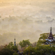 The view over the plain of temples, stupas rising from the mist, lakes and woodland. - PhotoDune Item for Sale