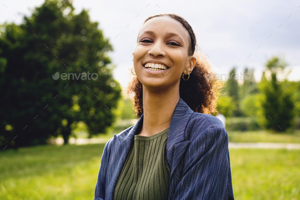 Genuine outdoor portrait of an hipster African American woman Stock ...