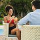 Summer Bliss: African American Woman Enjoys a Fruit Smoothie by the Pool&quot;  - PhotoDune Item for Sale
