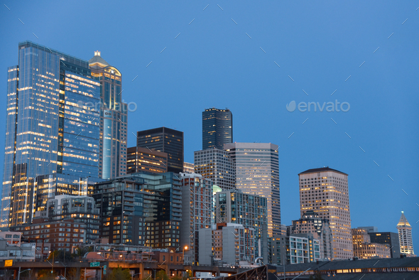 Downtown skyscrapers under blue dusk sky - Stock Photo - Images