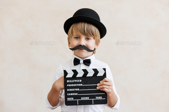 Child pretend to be a director - Stock Photo - Images