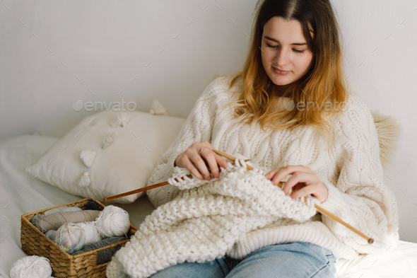 Teengirl knitting at home. Handmade and Hobby. - Stock Photo - Images