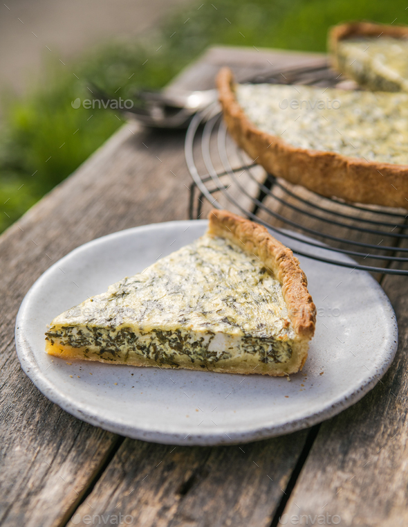 Quiche with spinach traditional dish of french cuisine. Spinach tart Stock Photo by sokorspace